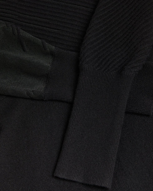 LEONHAA-Dresses-Add a swish to your step with LEONHAA. Crafted from a luxurious wool blend, this maxi dress wraps you in comfort and style simultaneously. With a flirty devoré bodice and flowing skirt, this wardrobe must-have turns heads for all the right reasons. Don't mind if we do. Maxi dress Fluted skirt Mock neck Wool and cashmere blend Long blouson sleeves Devoré striped bodice Hyunser is 5'10.5" / 1.79m and wears Black in a Ted size 1 Flattering fitFluted skirts complement a wide range of body types